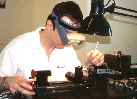 John Tope clock repair at the bench