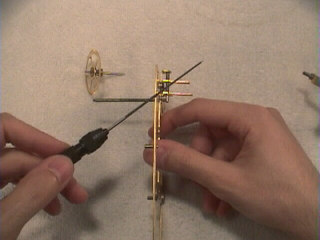 Learn Clock Repair - broaching the plate