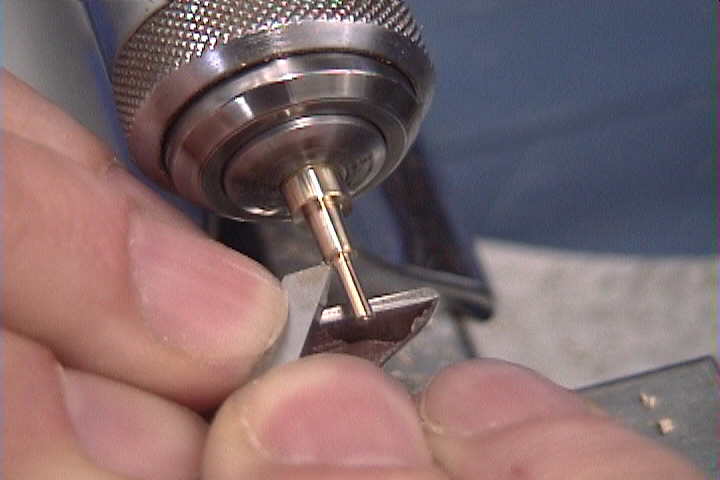 John Tope turning a part on the jewelers lathe